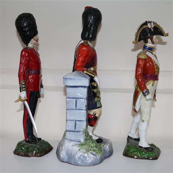 Three soldier figures